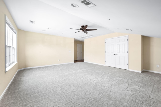8825 Caswick Ct, Nolensville, TN 37135 - carpeted spare room with vaulted ceiling, baseboards, and a ceiling fan