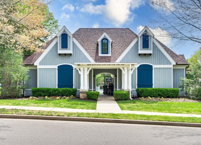 8825 Caswick Ct, Nolensville, TN 37135 - view of front facade with roof with shingles and a front lawn