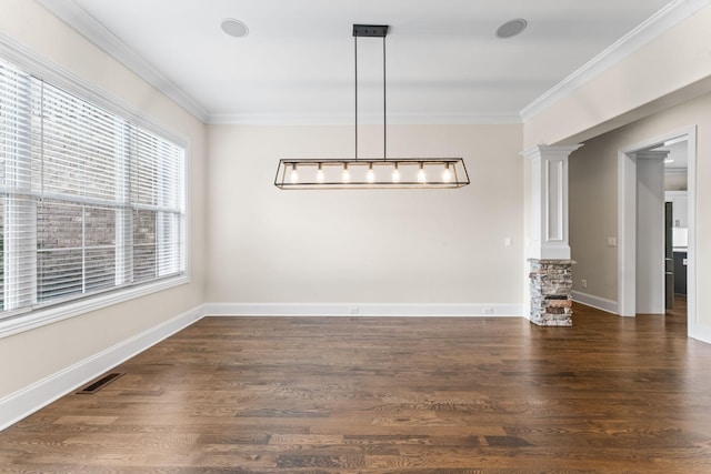 2006 Lynnhaven Ct, Mount Juliet, TN 37122 - unfurnished dining area with ornate columns, crown molding, dark wood-type flooring, and baseboards