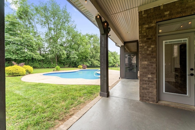 2006 Lynnhaven Ct, Mount Juliet, TN 37122 - outdoor pool featuring a patio, a lawn, and view of scattered trees