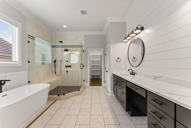 2006 Lynnhaven Ct, Mount Juliet, TN 37122 - bathroom featuring a stall shower, a freestanding bath, ornamental molding, vanity, and marble finish floors