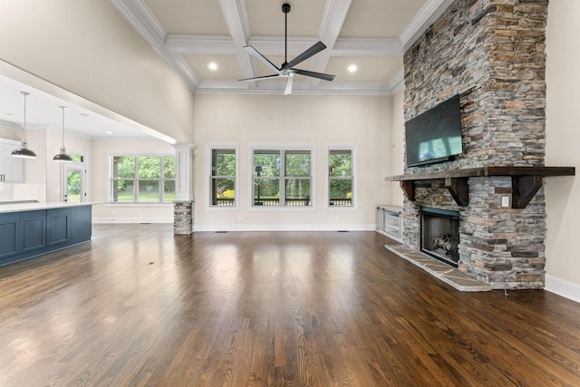 2006 Lynnhaven Ct, Mount Juliet, TN 37122 - unfurnished living room with a stone fireplace, a towering ceiling, beamed ceiling, baseboards, and ornamental molding