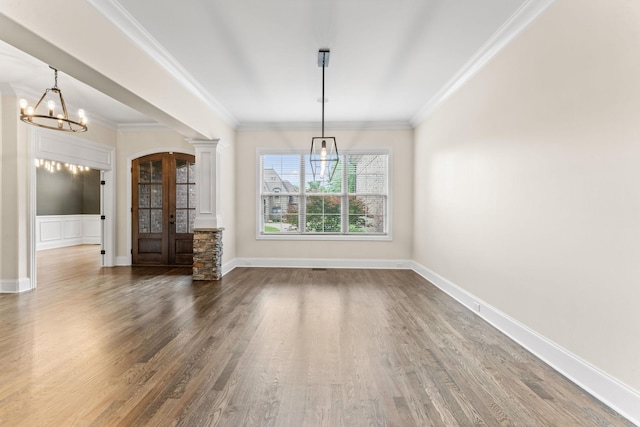 2006 Lynnhaven Ct, Mount Juliet, TN 37122 - unfurnished dining area with a chandelier, wood finished floors, ornamental molding, ornate columns, and baseboards