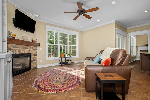 2245 Alexander Blvd, Murfreesboro, TN 37130 - living area featuring a ceiling fan, crown molding, tile patterned floors, a fireplace, and baseboards