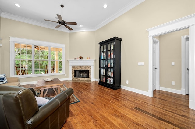 2245 Alexander Blvd, Murfreesboro, TN 37130 - living room with ceiling fan, crown molding, wood finished floors, a premium fireplace, and baseboards