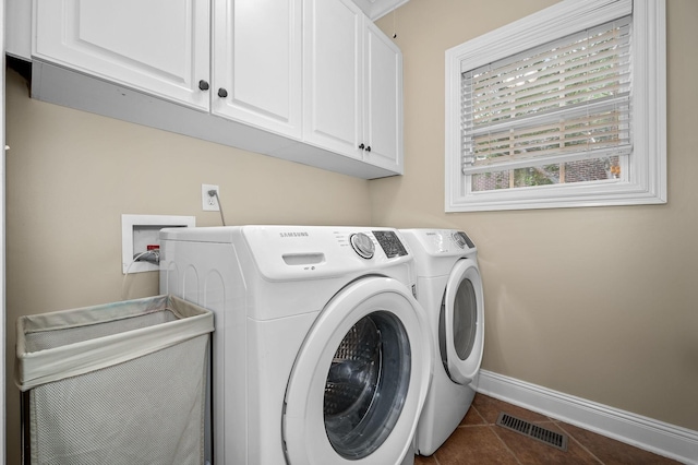 2245 Alexander Blvd, Murfreesboro, TN 37130 - washroom featuring cabinet space, washing machine and dryer, baseboards, and tile patterned flooring