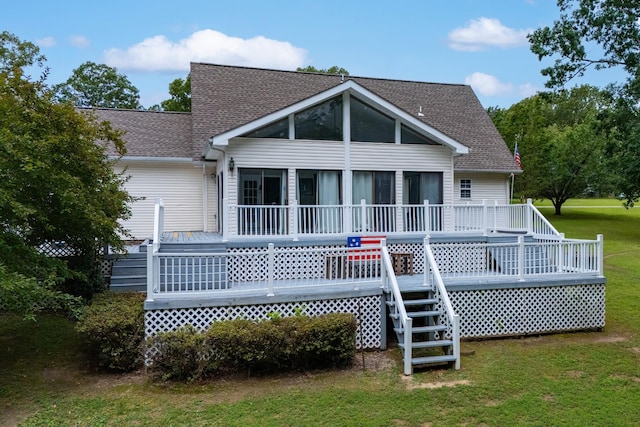 115 Pin Oaks Ln, Hohenwald, TN 38462 - back of property with roof with shingles, a yard, stairs, a sunroom, and a wooden deck