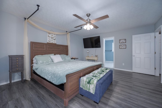 115 Pin Oaks Ln, Hohenwald, TN 38462 - bedroom featuring dark wood-style floors, baseboards, and a ceiling fan