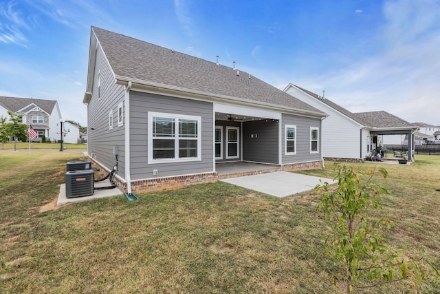 4015 Brazelton Way, Fairview, TN 37062 - rear view of house featuring a patio area, a yard, cooling unit, and a shingled roof