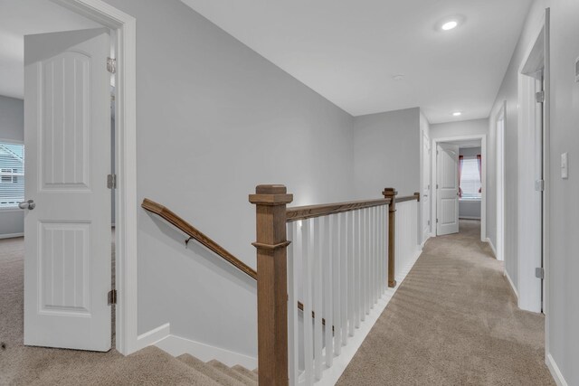 4015 Brazelton Way, Fairview, TN 37062 - hall with light carpet, an upstairs landing, baseboards, and recessed lighting