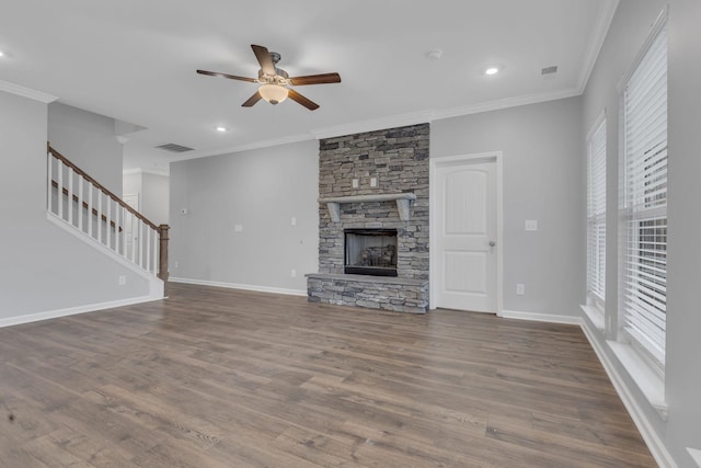 4015 Brazelton Way, Fairview, TN 37062 - unfurnished living room with a ceiling fan, plenty of natural light, stairway, wood finished floors, and crown molding