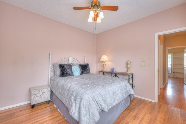 302 Laurel Hill Dr, Old Hickory, TN 37138 - bedroom featuring baseboards, wood finished floors, and ceiling fan