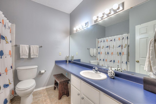 302 Laurel Hill Dr, Old Hickory, TN 37138 - full bathroom with toilet, vanity, tile patterned floors, and baseboards