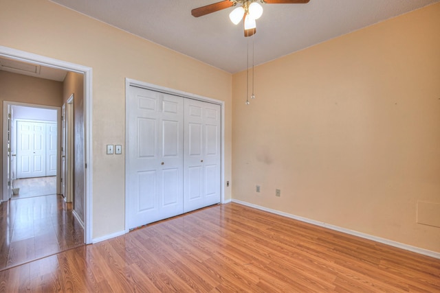 302 Laurel Hill Dr, Old Hickory, TN 37138 - unfurnished bedroom featuring light wood-type flooring, baseboards, a closet, and ceiling fan