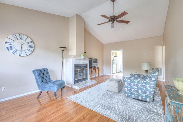 302 Laurel Hill Dr, Old Hickory, TN 37138 - living area featuring high vaulted ceiling, ceiling fan, a fireplace, wood finished floors, and baseboards