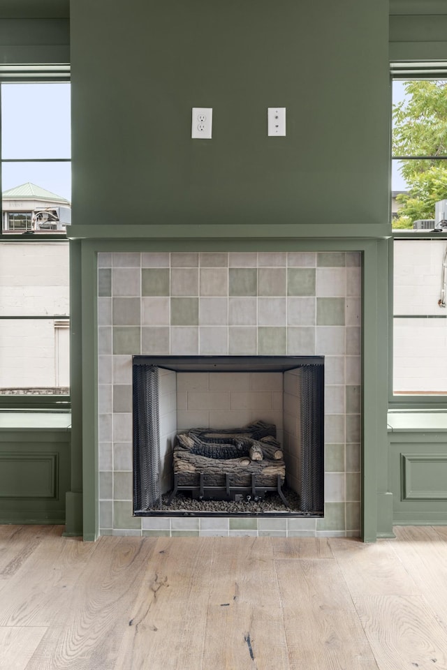 1701 Portland Ave Unit E, Nashville, TN 37212 - detailed view of a tiled fireplace and wood finished floors