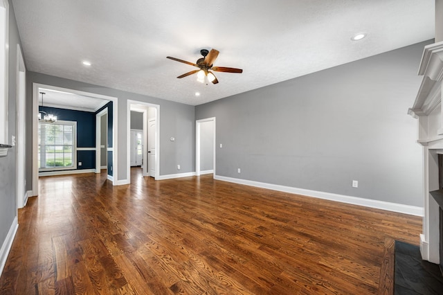 167 Lancaster St, Hillsboro, TN 37342 - unfurnished living room with a ceiling fan, a fireplace, dark wood finished floors, baseboards, and recessed lighting