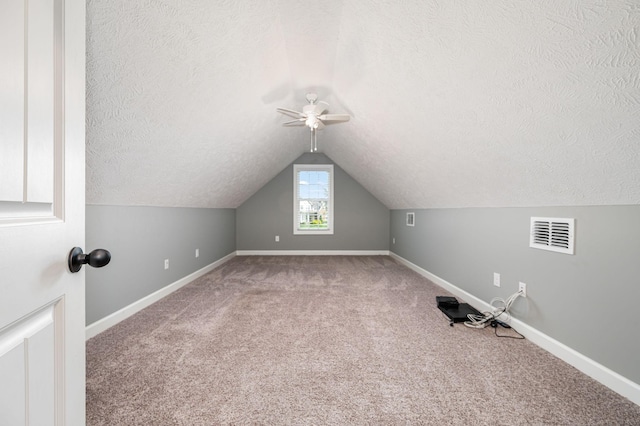 167 Lancaster St, Hillsboro, TN 37342 - bonus room featuring carpet flooring, vaulted ceiling, a textured ceiling, a ceiling fan, and baseboards