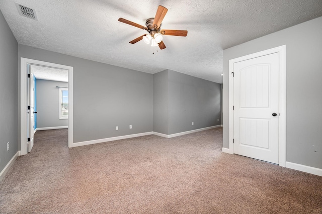 167 Lancaster St, Hillsboro, TN 37342 - unfurnished room featuring a textured ceiling, a ceiling fan, carpet flooring, and baseboards