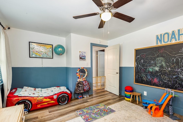 349 Dawn Dr, Cedar Hill, TN 37032 - bedroom with wood finished floors and ceiling fan