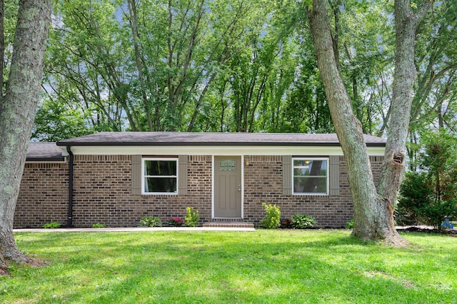 349 Dawn Dr, Cedar Hill, TN 37032 - ranch-style home featuring a front yard and brick siding