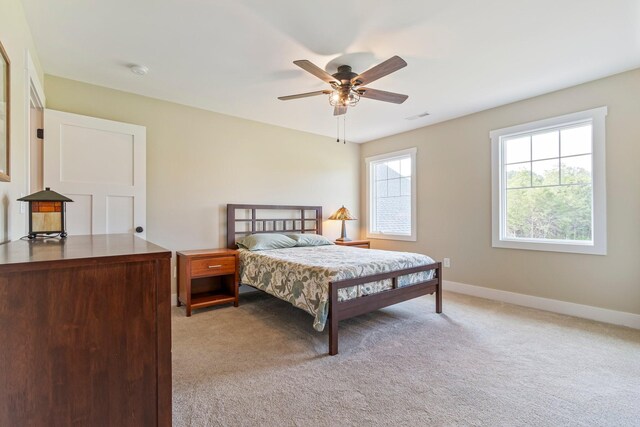 2825 Oregon Rd, Milton, TN 37118 - bedroom featuring light carpet, baseboards, and ceiling fan