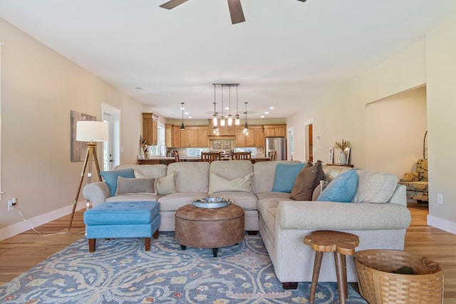 2825 Oregon Rd, Milton, TN 37118 - living room with light wood-style flooring, ceiling fan, baseboards, and recessed lighting
