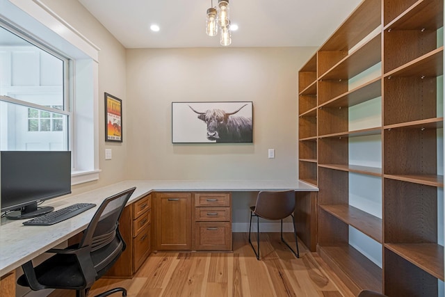 2825 Oregon Rd, Milton, TN 37118 - office area with built in desk and light wood-type flooring