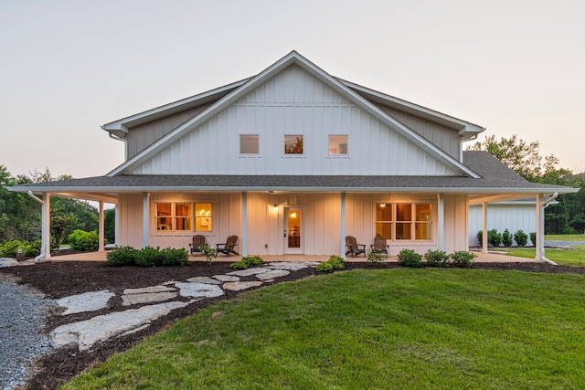 2825 Oregon Rd, Milton, TN 37118 - view of front facade with a front yard, covered porch, roof with shingles, and board and batten siding