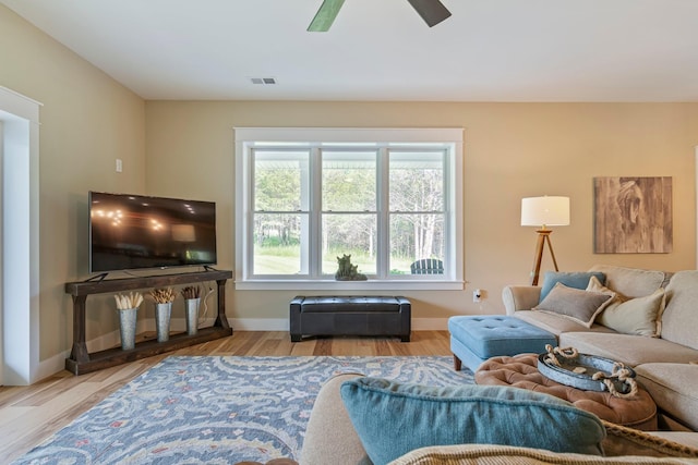 2825 Oregon Rd, Milton, TN 37118 - living room featuring wood finished floors, baseboards, and ceiling fan