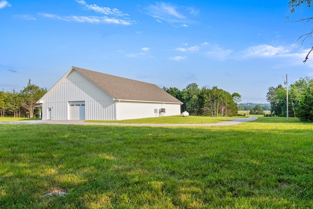 2825 Oregon Rd, Milton, TN 37118 - view of side of property with a garage, a lawn, and an outdoor structure