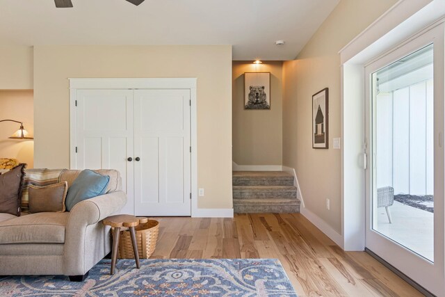2825 Oregon Rd, Milton, TN 37118 - living area with light wood-style floors, stairway, baseboards, and ceiling fan