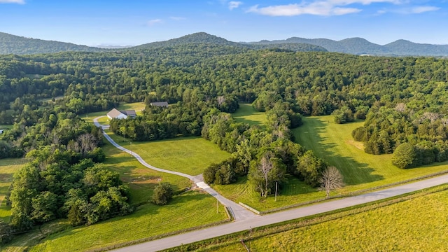 2825 Oregon Rd, Milton, TN 37118 - drone / aerial view of a heavily wooded area and a mountain backdrop