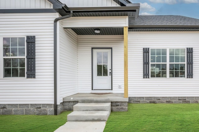 1502 Rock Springs Rd, Cumberland Furnace, TN 37051 - view of exterior entry with a yard and roof with shingles