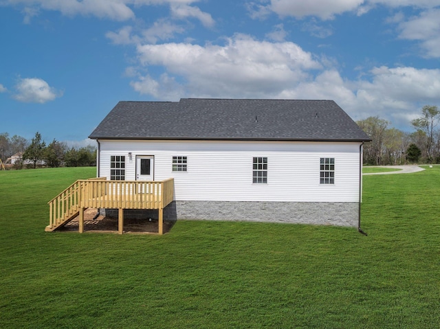 1502 Rock Springs Rd, Cumberland Furnace, TN 37051 - back of house featuring a wooden deck, a lawn, and roof with shingles