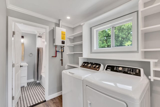 325 Francis Rd, Decherd, TN 37324 - laundry area featuring water heater, baseboards, ornamental molding, washer and dryer, and recessed lighting
