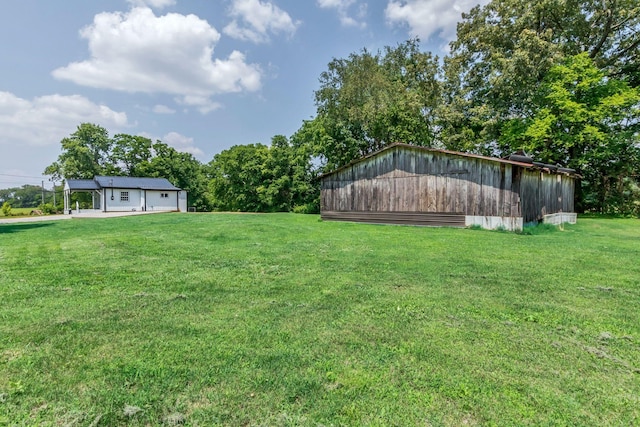 325 Francis Rd, Decherd, TN 37324 - view of green lawn featuring an outbuilding