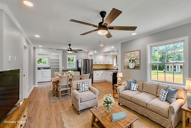 325 Francis Rd, Decherd, TN 37324 - living area with independent washer and dryer, ornamental molding, plenty of natural light, a ceiling fan, and recessed lighting