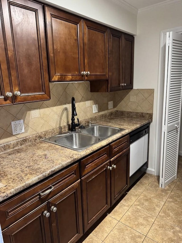 2929 Selena Dr Unit B30, Nashville, TN 37211 - kitchen featuring dishwasher, a sink, crown molding, tasteful backsplash, and light tile patterned flooring
