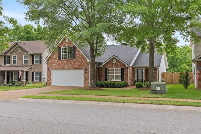 3164 Winberry Dr, Franklin, TN 37064 - view of front of property with driveway, brick siding, a garage, and a shingled roof