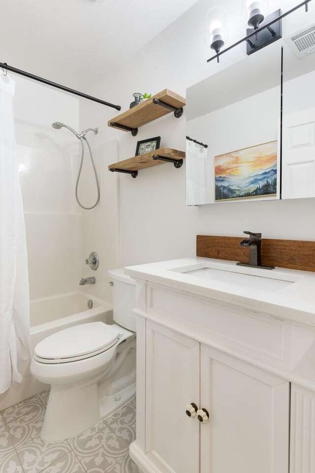 3164 Winberry Dr, Franklin, TN 37064 - full bathroom featuring shower / bath combo, vanity, toilet, and tile patterned flooring