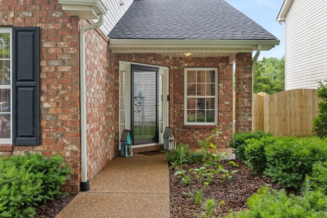 3164 Winberry Dr, Franklin, TN 37064 - view of exterior entry with brick siding and a shingled roof