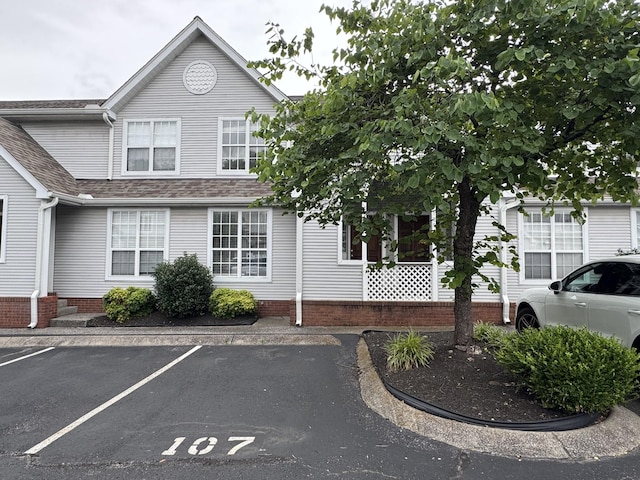 107 Sylvan Glen Ct, Nashville, TN 37209 - view of front of home with uncovered parking and a shingled roof