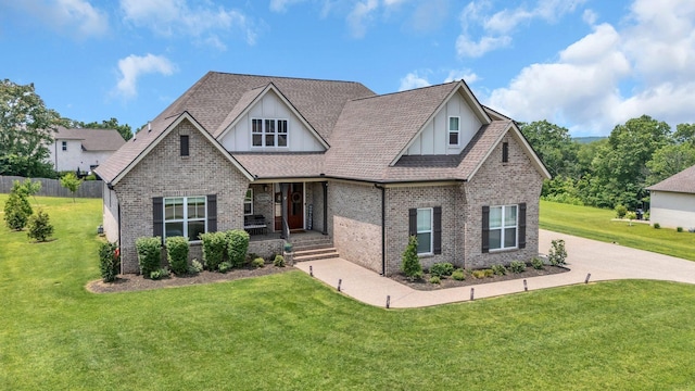 2732 Cherrydale Dr, Lebanon, TN 37087 - craftsman house with brick siding, a front yard, and roof with shingles