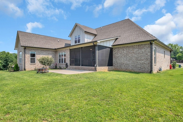 2732 Cherrydale Dr, Lebanon, TN 37087 - rear view of house with a patio area, a sunroom, brick siding, a lawn, and board and batten siding