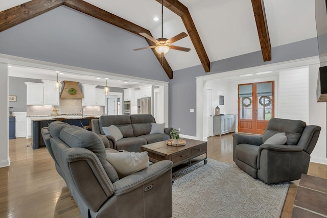 2732 Cherrydale Dr, Lebanon, TN 37087 - living area featuring ceiling fan, light wood-type flooring, beam ceiling, baseboards, and high vaulted ceiling