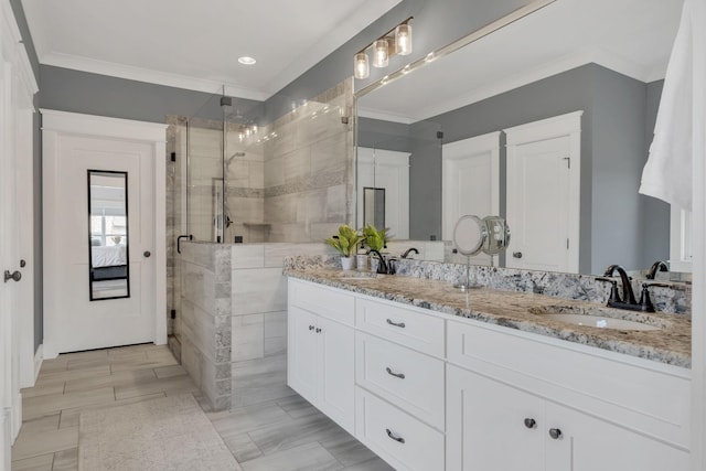 2732 Cherrydale Dr, Lebanon, TN 37087 - ensuite bathroom with double vanity, a stall shower, crown molding, and recessed lighting