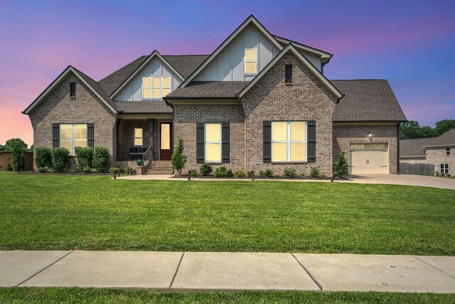 2732 Cherrydale Dr, Lebanon, TN 37087 - craftsman house with an attached garage, a front yard, brick siding, concrete driveway, and a shingled roof