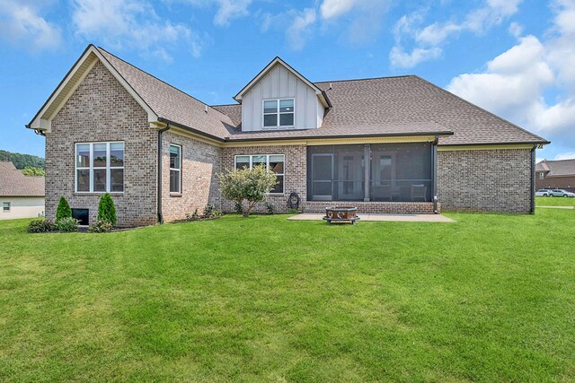 2732 Cherrydale Dr, Lebanon, TN 37087 - rear view of property featuring a sunroom, brick siding, and a lawn