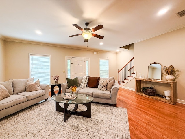 2138 Cason Ln, Murfreesboro, TN 37128 - living room with ceiling fan, crown molding, light wood finished floors, plenty of natural light, and recessed lighting